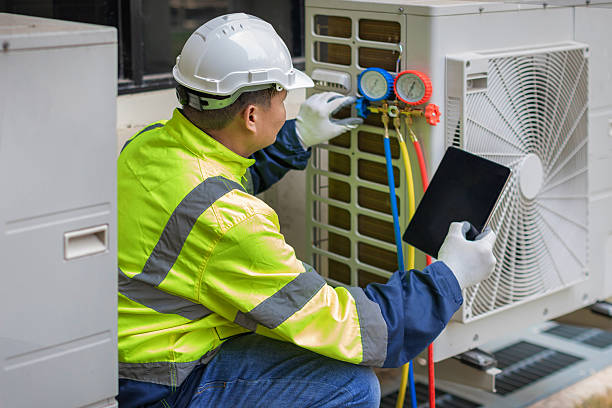 Professional Air Conditioning Repair technician working in Glen Head, NY